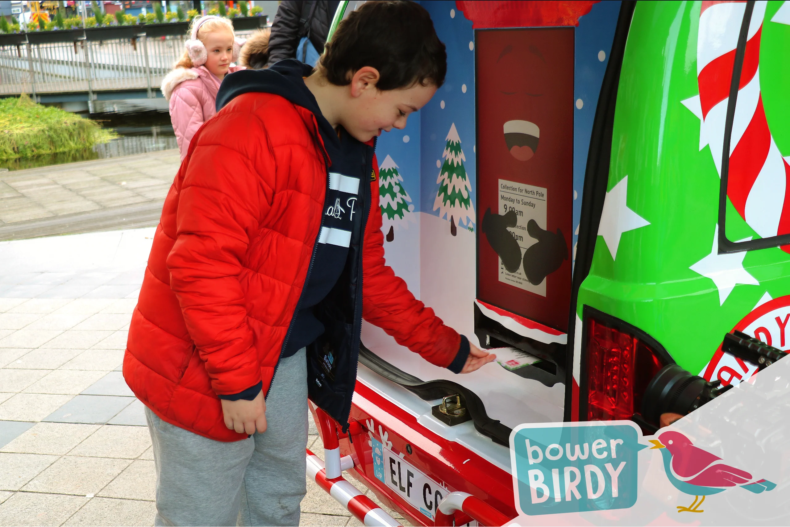 Christmas Magic in Watford: A boy posts a letter into the Enchanted Postbox