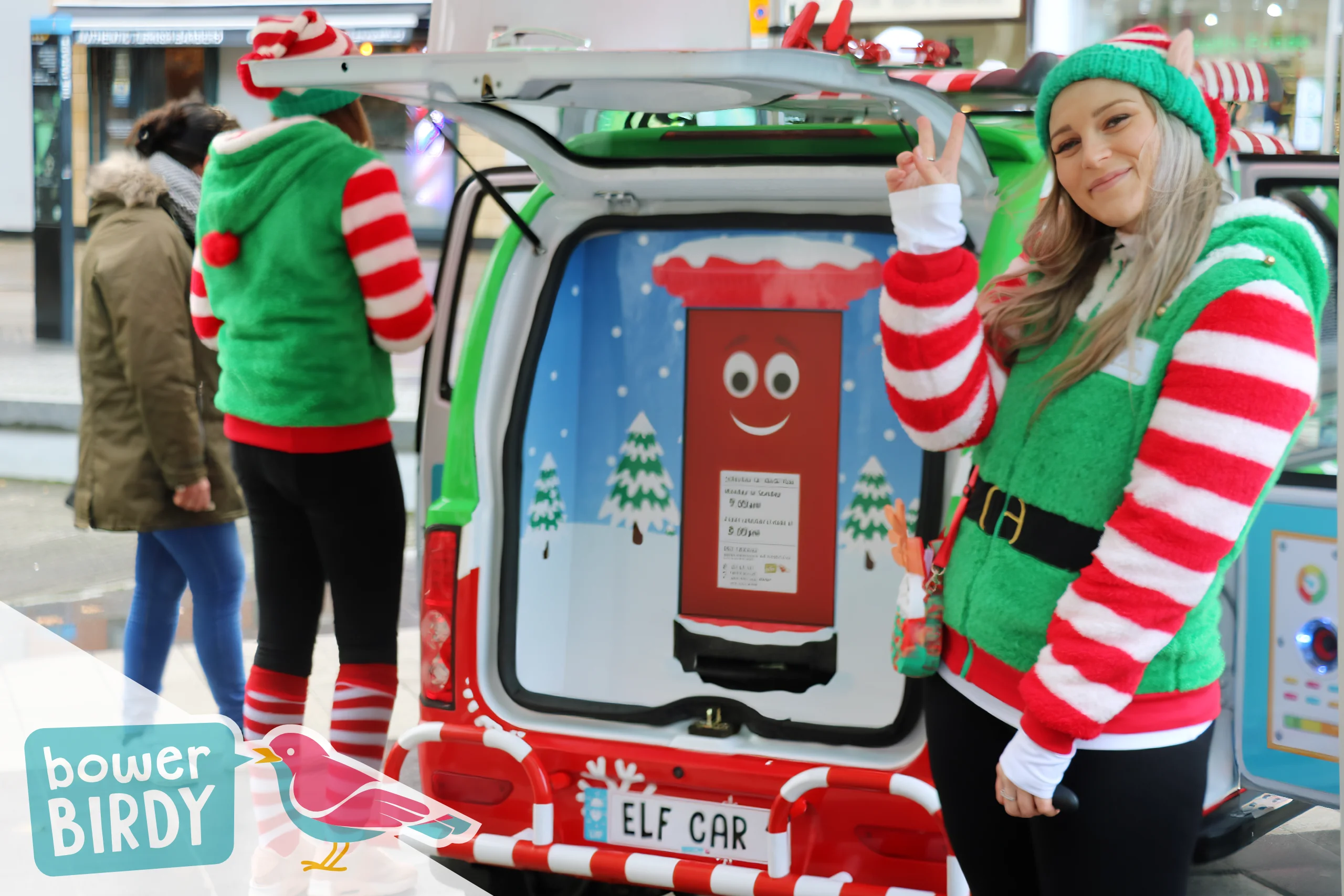 A Bowerbirdy elf poses with the Enchanted Postbox