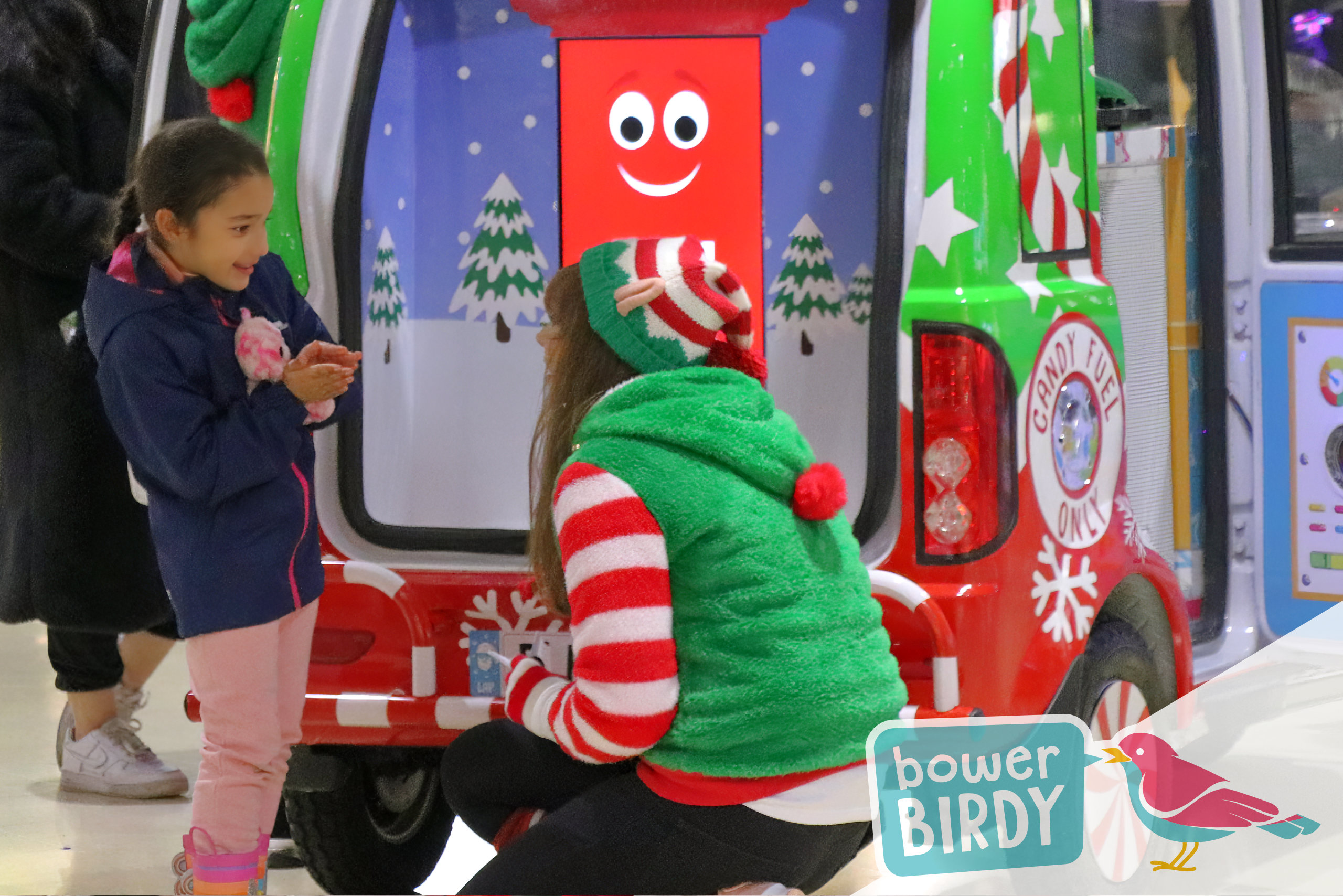 A girl talks to a Bowerbirdy elf