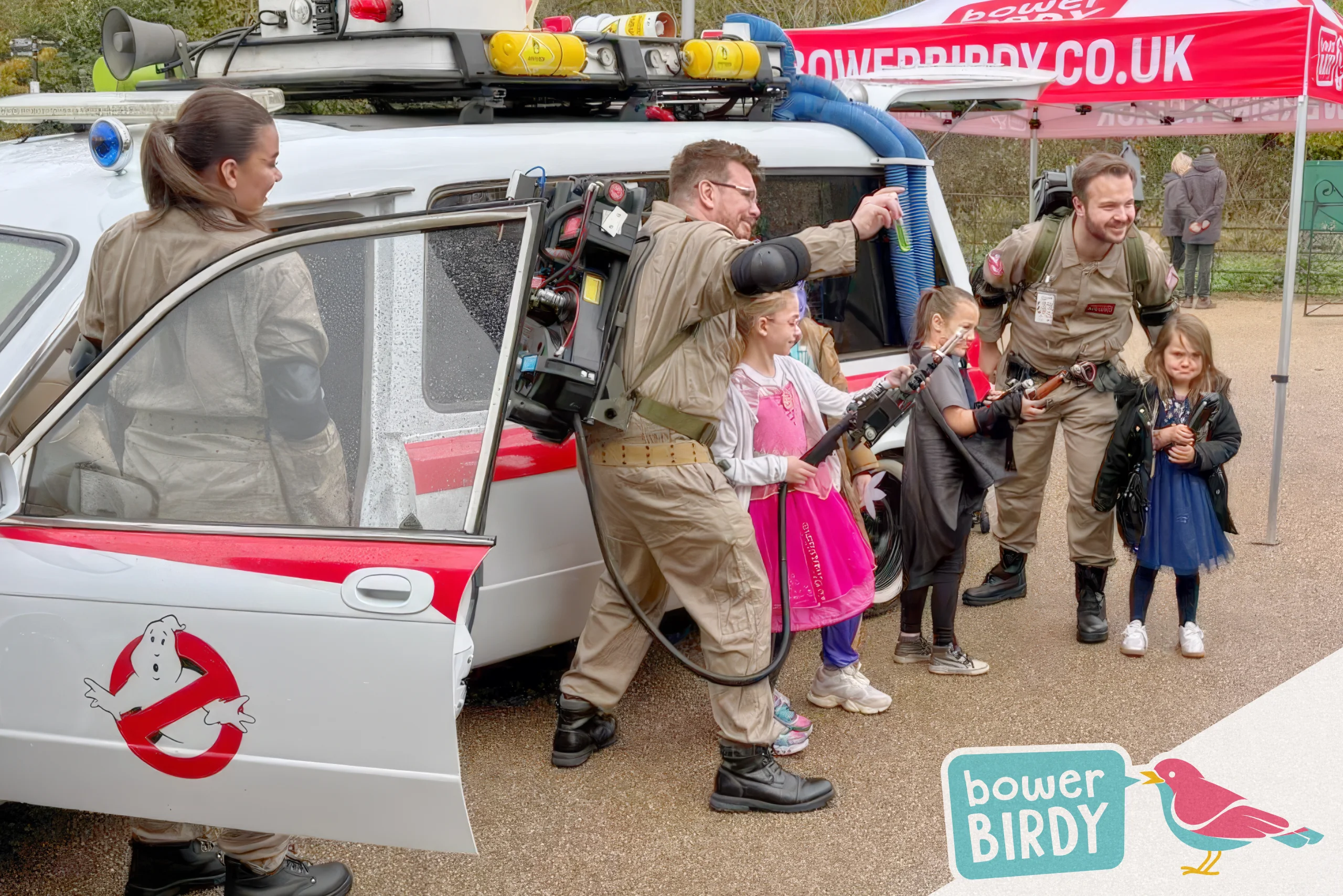 Young recruits pose for a photo with the Ghostbusters